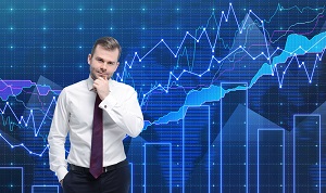Trader is standing in front of the forex graph. A metaphor of international financial consulting. Blue background.